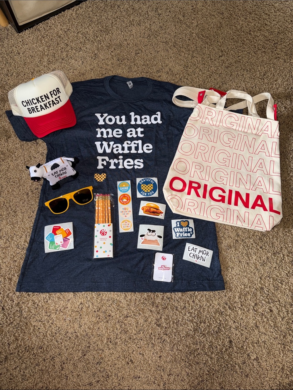 Chick fil a bag with shirt and other fun goodies